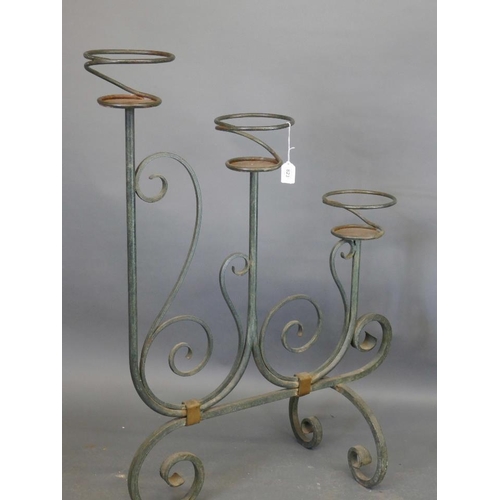 899 - An Art Nouveau wrought iron jardinière stand, 30