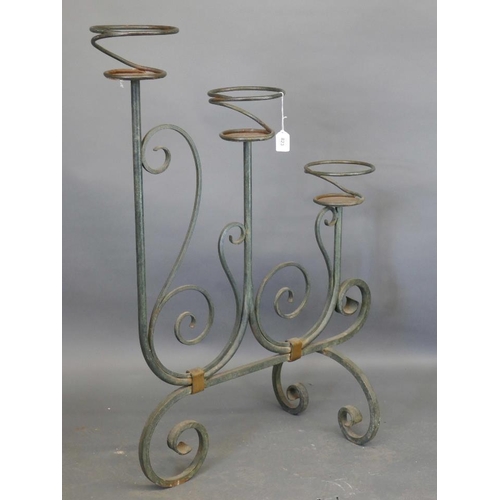 899 - An Art Nouveau wrought iron jardinière stand, 30