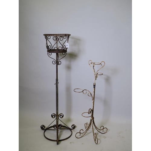 891 - A wrought iron adjustable urn stand and a four pot stand, 31