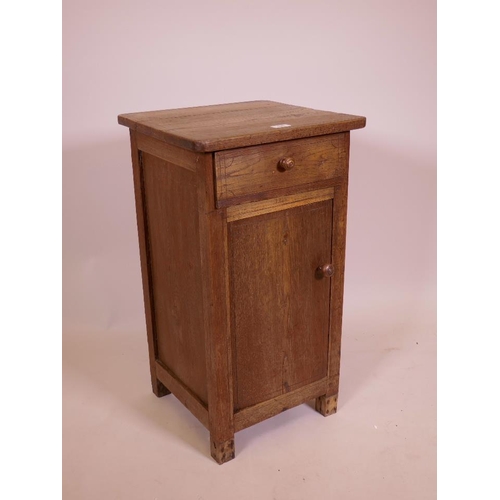 885 - A C19th oak pot cupboard with single drawer over a cupboard, 16