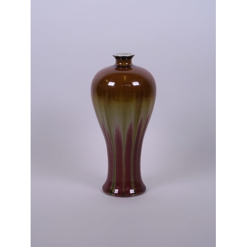 48 - A Chinese pottery vase of waisted form with tri-colour glaze, 8