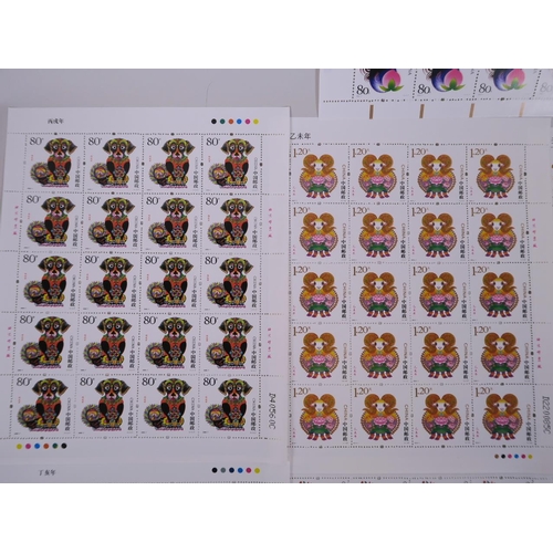 51 - A collection of twelve Chinese facsimile (replica) stamp sheets depicting animals of the zodiac, 7