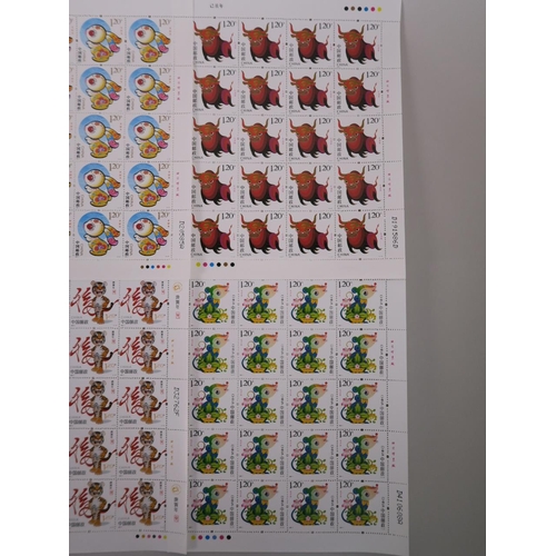 51 - A collection of twelve Chinese facsimile (replica) stamp sheets depicting animals of the zodiac, 7