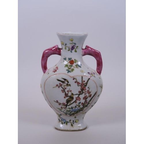 58 - A Chinese polychrome enamelled two handled flask decorated with birds and butterflies amongst flower... 