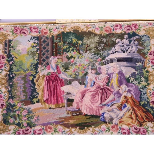 62 - A ladies petit point embroidered handbag decorated with a classical scene, bears label to interior '... 