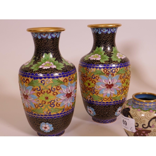 69 - A pair of cloisonne vases with lotus decoration, 4