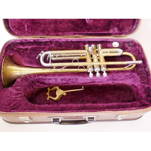 84 - A brass trumpet, inscribed Clippertone, Malta, in fitted case