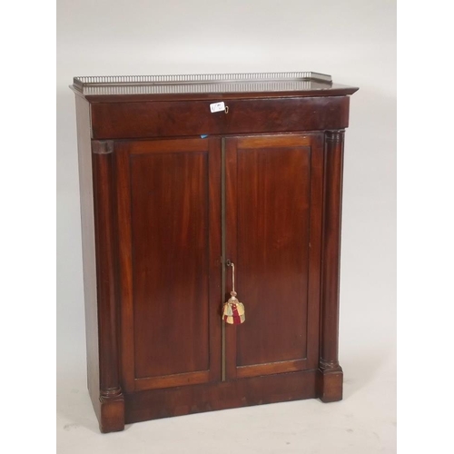 872 - A C19th mahogany side cabinet, with frieze drawer and two cupboards, the top with pierced brass gall... 