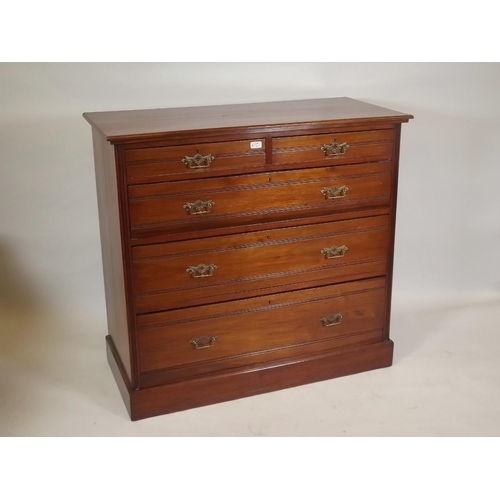 873 - A Victorian walnut chest of two over three drawers on a plinth base, 42