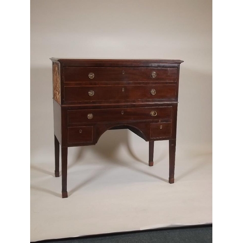 888 - A C19th inlaid mahogany kneehole secretaire, with fitted interior, raised on square tapering support... 