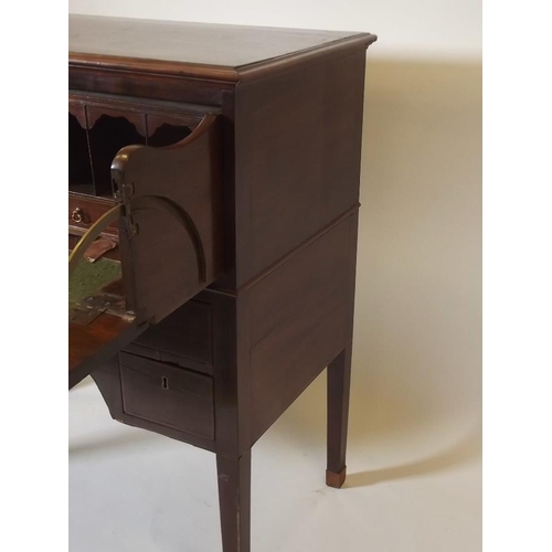 888 - A C19th inlaid mahogany kneehole secretaire, with fitted interior, raised on square tapering support... 