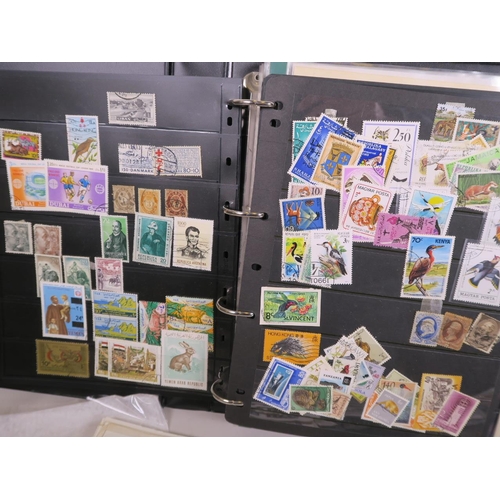 92 - A large quantity of British and world postage stamps, dating from the 1950s onwards, album mounted