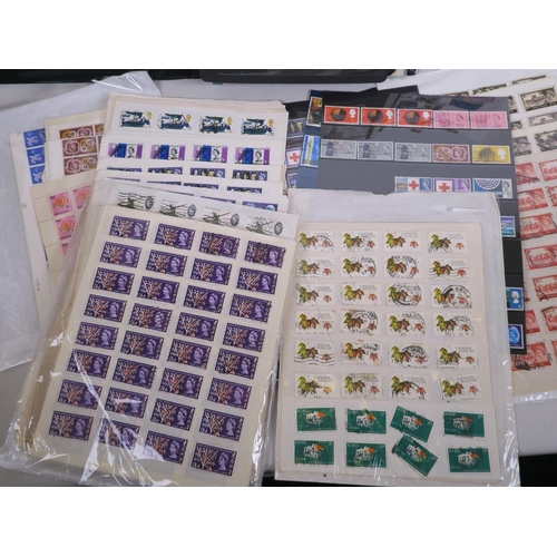 92 - A large quantity of British and world postage stamps, dating from the 1950s onwards, album mounted