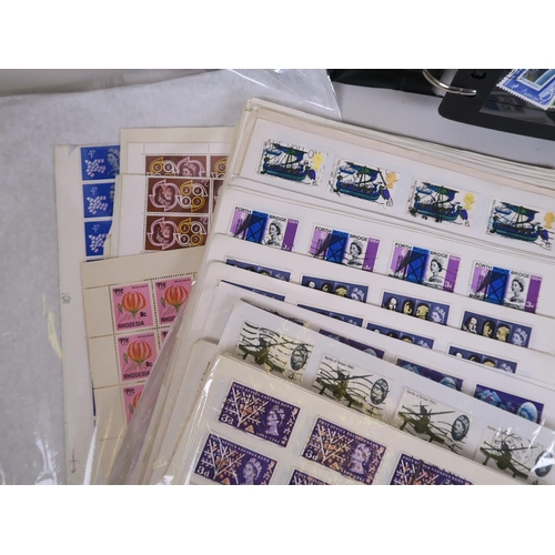 92 - A large quantity of British and world postage stamps, dating from the 1950s onwards, album mounted