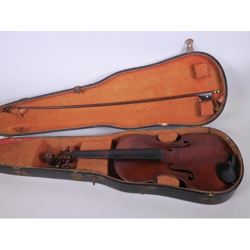 97 - A C19th violin with one piece back together with bow in a fitted case