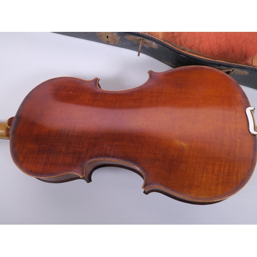 97 - A C19th violin with one piece back together with bow in a fitted case