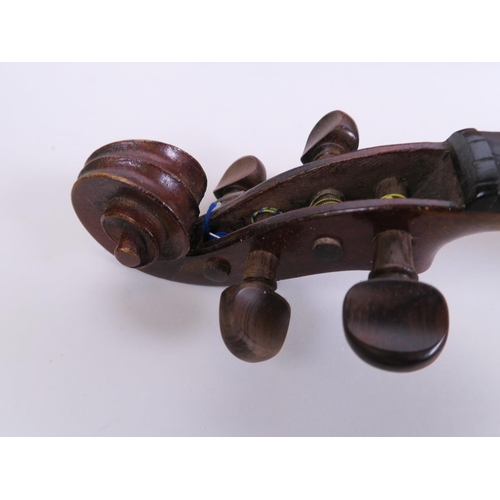 97 - A C19th violin with one piece back together with bow in a fitted case