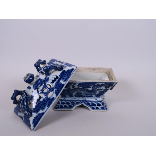 98 - A Chinese blue and white porcelain twin handled censer in the form of a chest, decorated with dragon... 