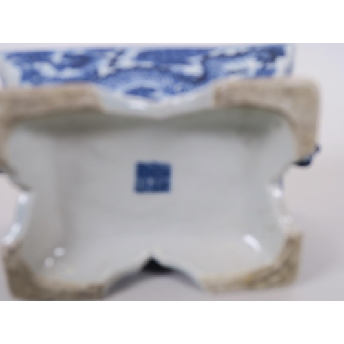 98 - A Chinese blue and white porcelain twin handled censer in the form of a chest, decorated with dragon... 