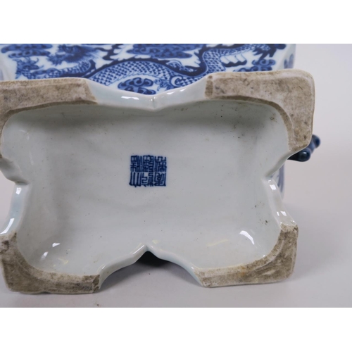 98 - A Chinese blue and white porcelain twin handled censer in the form of a chest, decorated with dragon... 