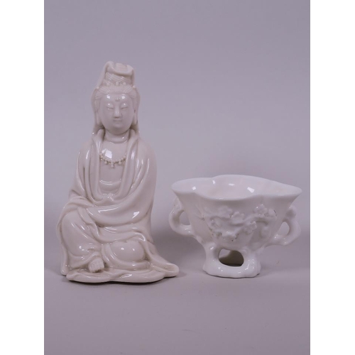 10 - A Chinese blanc de chine figure of Quan Yin, together with a blanc de chine twin handled salt, impre... 