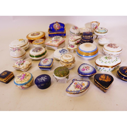 23 - A collection of continental porcelain trinket boxes, mainly Limoges (30)