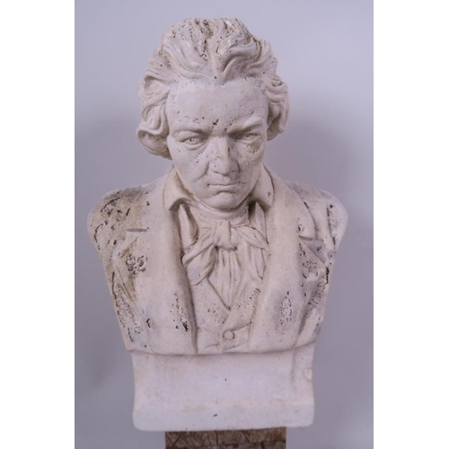 61 - A stoneware bust of Beethoven mounted on a marble socle, 12