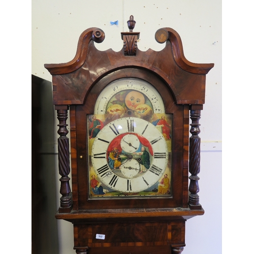 1210 - A C19th mahogany long case clock, with well figured veneered front, shaped door and carved twist col... 