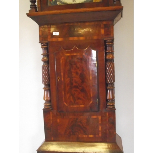 1210 - A C19th mahogany long case clock, with well figured veneered front, shaped door and carved twist col... 