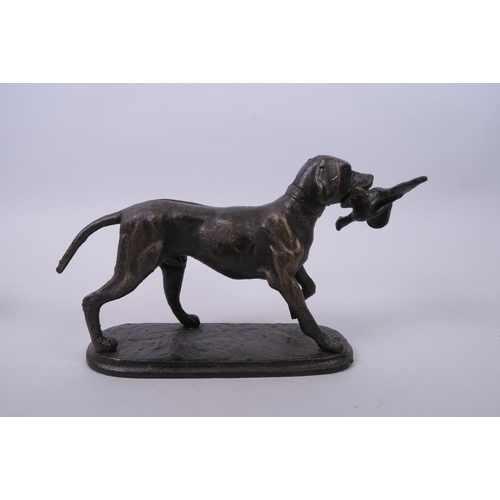 42 - A bronzed cast metal doorstop in the form of a gun dog retrieving game, 8½