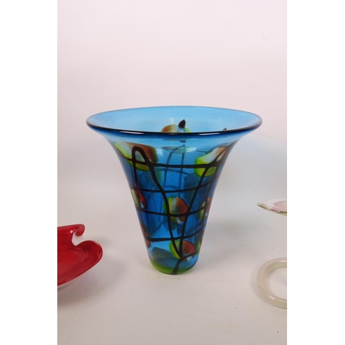 56 - A Murano glass candle holder in the form of a flower, together with a large studio glass vase and a ... 