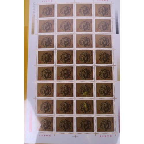 58 - A wallet of facsimile (replica) Chinese stamps, commemorating the Millenium, 8