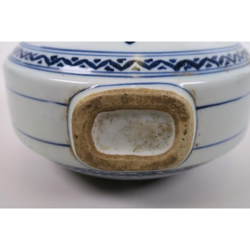 60 - A Chinese blue and white twin handled moon flask, with yin and yang decoration, 6 character mark to ... 