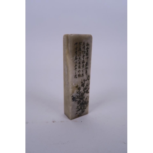 61 - A Chinese soapstone seal, with engraved character inscription and prunus tree decoration, 4