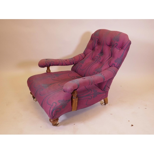 1168 - A Victorian Howard pattern satin birch open armchair