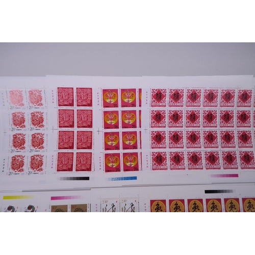 28 - A quantity of facsimile (replica) Chinese stamp sheets celebrating animals of the zodiac, 9