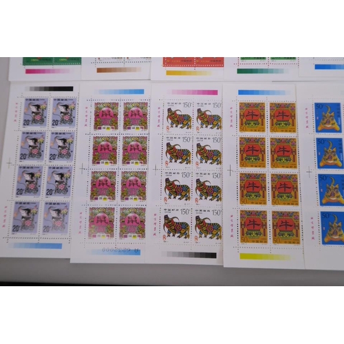 28 - A quantity of facsimile (replica) Chinese stamp sheets celebrating animals of the zodiac, 9