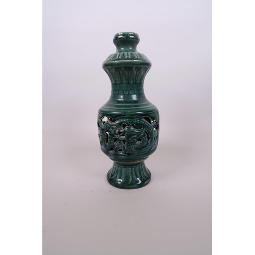 31 - A Chinese green crackle glazed porcelain vase of unusual form, with pierced sides decorated with dra... 