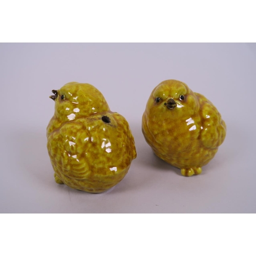 38 - A pair of Chinese porcelain taper holders in the form of chicks, seal marks to bases, 2½