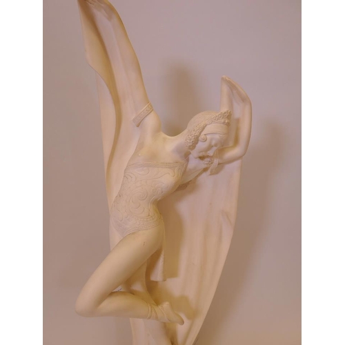 59 - An Art Deco style plaster figure of a dancer, 27½