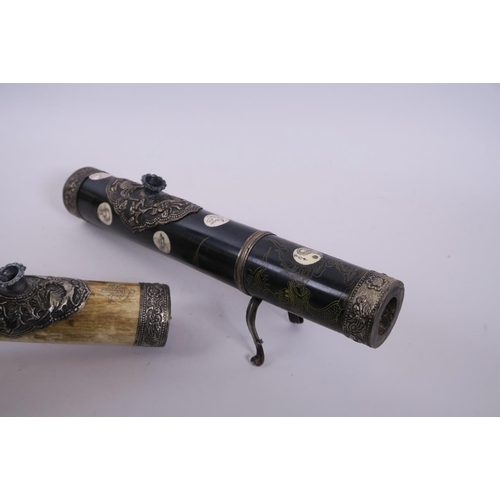 9 - A Chinese sectional bone and composition opium pipe with white metal mounts and engraved decoration ... 