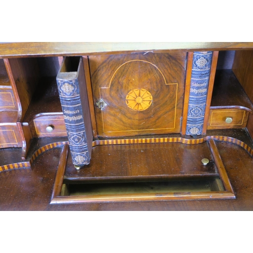 1201 - A C18th style Dutch bombe shaped bureau, the fall front with fitted interior, over three drawers, ra... 