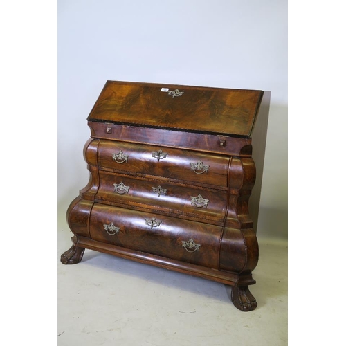 1201 - A C18th style Dutch bombe shaped bureau, the fall front with fitted interior, over three drawers, ra... 