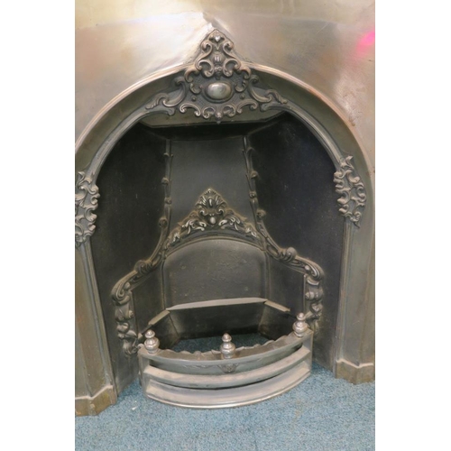 1206 - A Victorian style steel fireplace, with cast decoration, 40