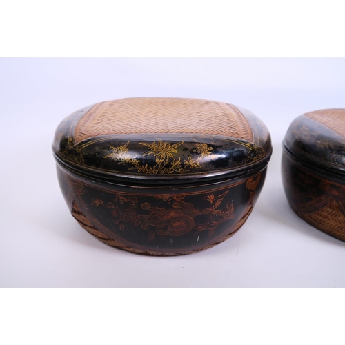 29 - A pair of C19th Oriental lacquered rattan food containers with gilt decoration of fruit and flowers,... 