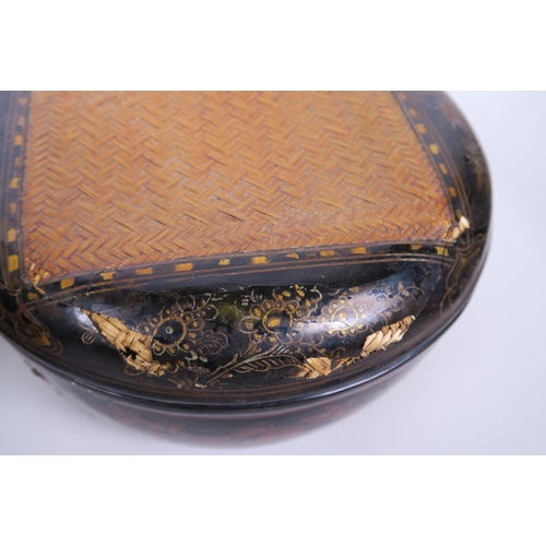 29 - A pair of C19th Oriental lacquered rattan food containers with gilt decoration of fruit and flowers,... 