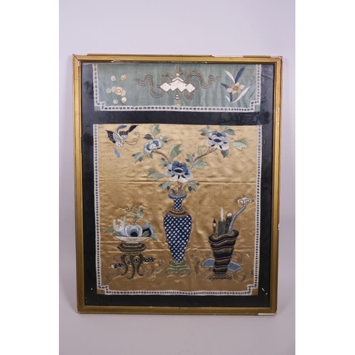 49 - A Chinese framed embroidered silk panel depicting a vase of flowers, fruit and scribes' equipment, 1... 