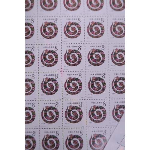 54 - A set of four Chinese facsimile (replica) stamp sheets depicting animals of the zodiac, 9½