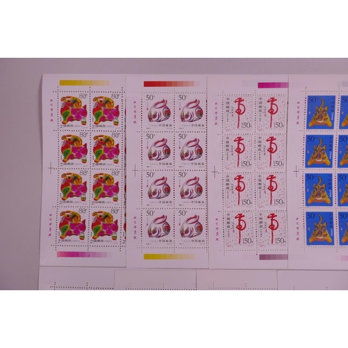 11 - A collection of 24 facsimile (replica) Chinese stamp sheets decorated with animals of the zodiac, 9½... 