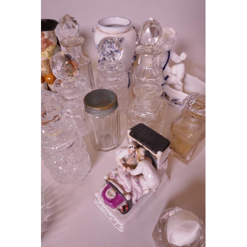 12 - A quantity of pottery, porcelain and glassware to include dressing table items, five Royal Doulton T... 